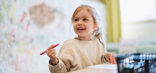 a little girl painting
